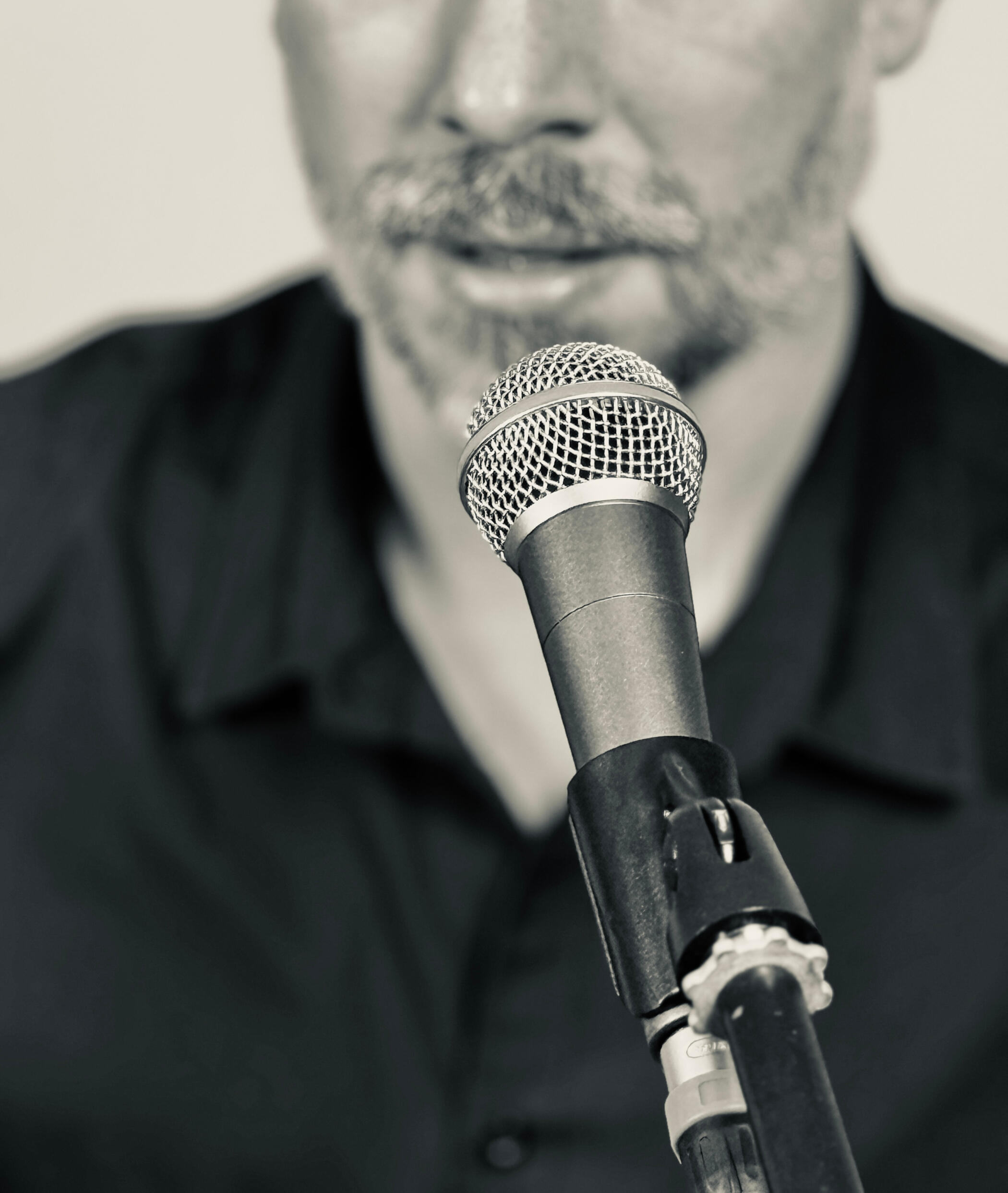 Servizi Podcast Microphone in front of a mouth